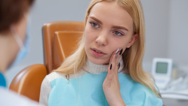 Beautiful,Young,Woman,Suffering,From,Toothache,,Visiting,Dentist.,Professional,Dentist Beautiful,Young,Woman,Suffering,From,Toothache,,Visiting,Dentist.,Professional,Dentist