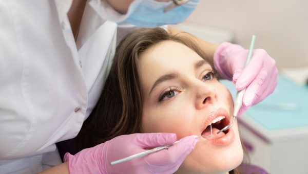 Young,Woman,Visit,Dentistry,Clinic,For,Professional,Teeth,Treatment.,Woman Young,Woman,Visit,Dentistry,Clinic,For,Professional,Teeth,Treatment.,Woman